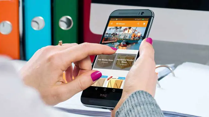 app developer using an app on mobile device