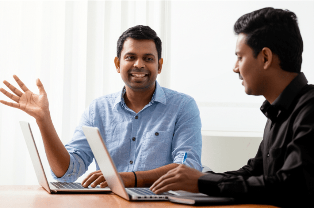 A Gampaha business owner in a productive meeting with their local web design team.