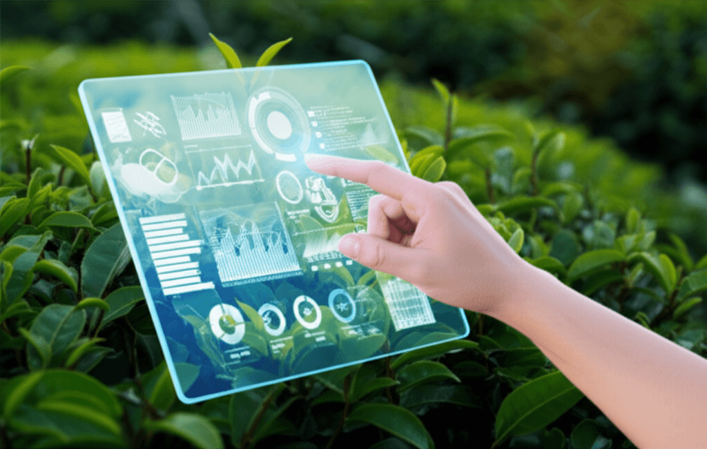 A tablet displaying agricultural data from IoT sensors in a modern tea field.