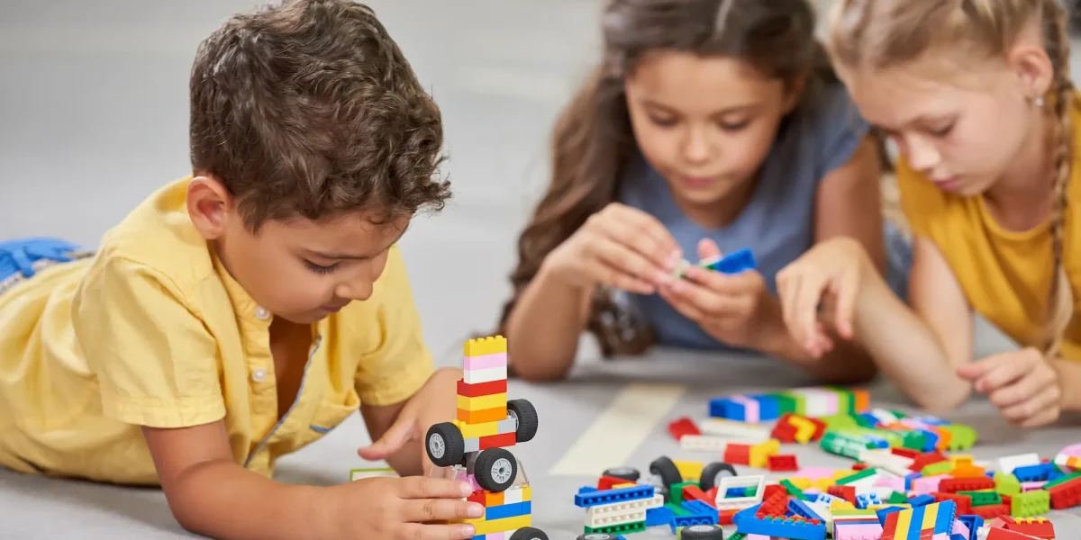 children-playing-together-in-the-classroom-in-kindergarten-