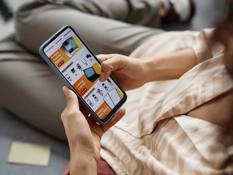 mobile app development in sri lanka girl using a mobile app designed and developed in sri lanka